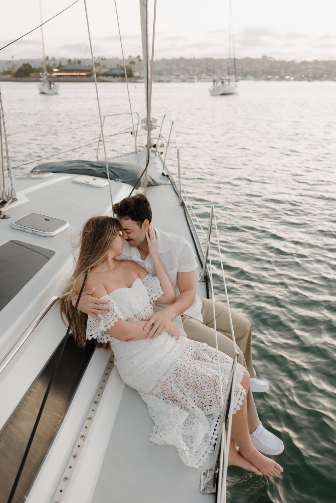 San Diego engament session on sailboat with Sail San Diego and Kassidy Klicks