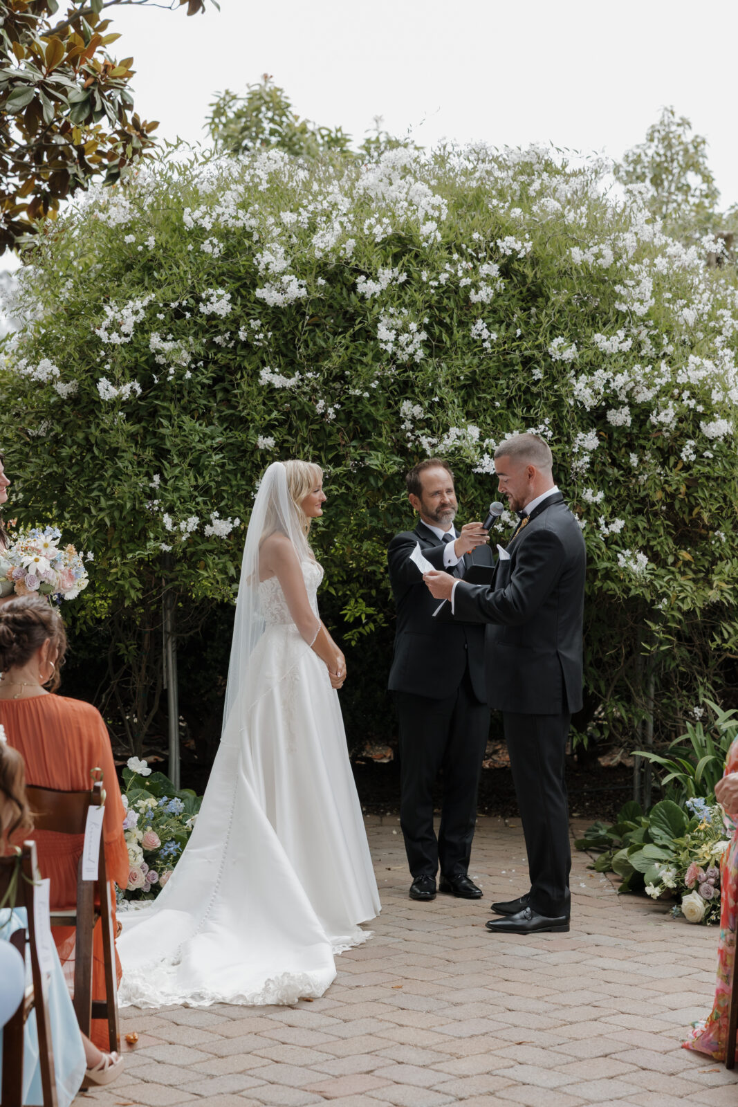 Vows during California Italian garden inspired wedding venue by Kassidy Klicks 