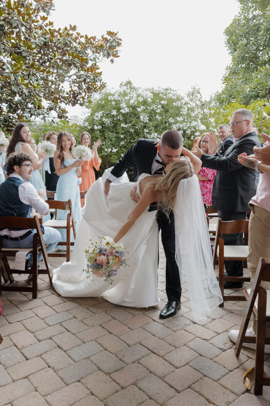 Aside dip kiss California Italian garden inspired wedding venue by Kassidy Klicks 