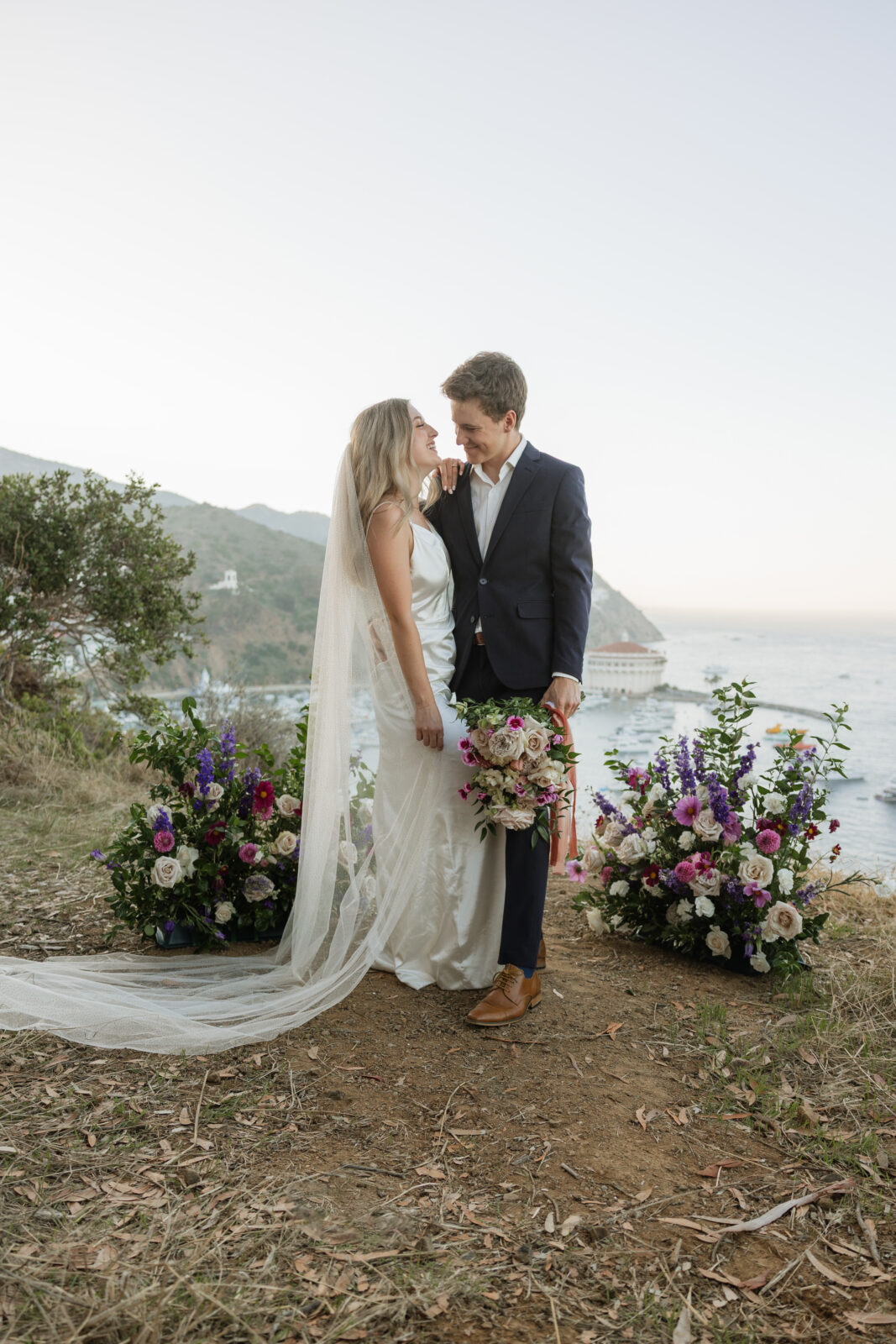 Bride and groom portraits in Catalina Island cliffside wedding