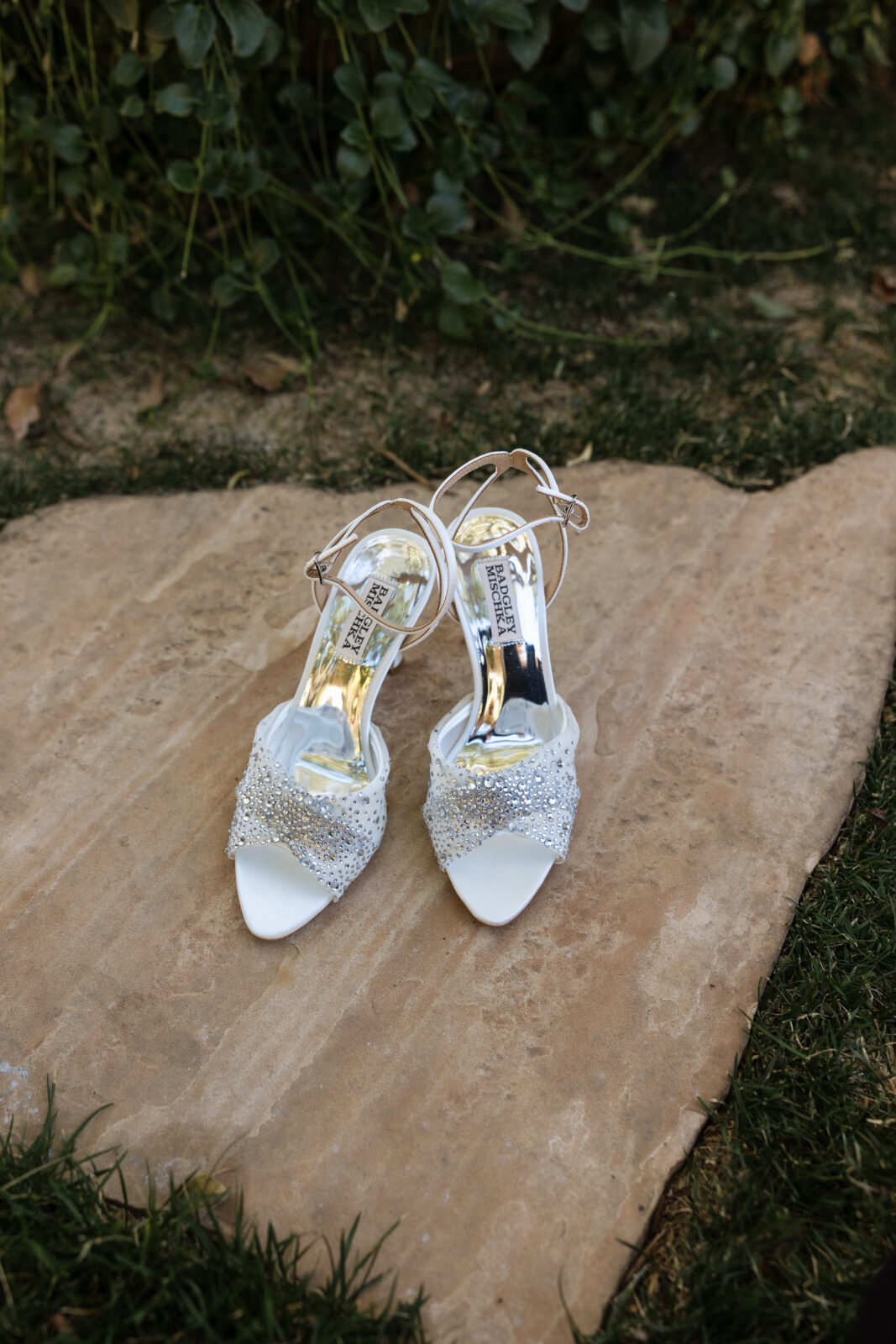 Bride’s wedding shoes displayed during getting ready at Serendipity Garden in Oak Glen, California, elegant bridal detail